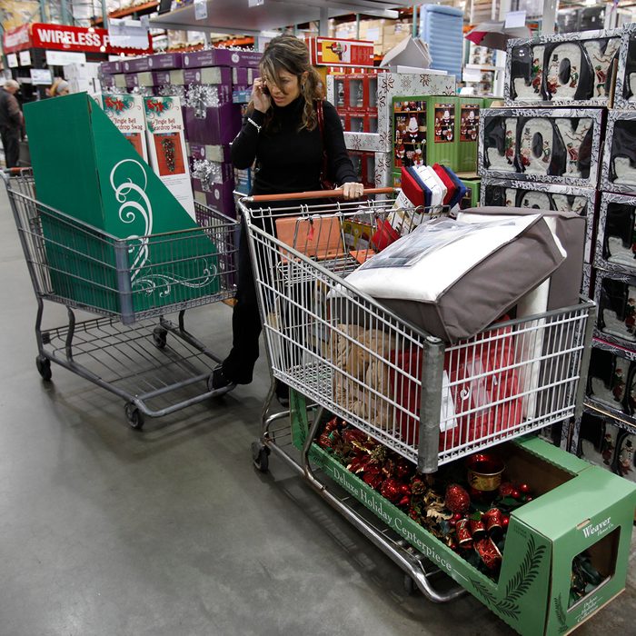 Shopper with two loads of Christmas items at Costco in Mountain View, Calif