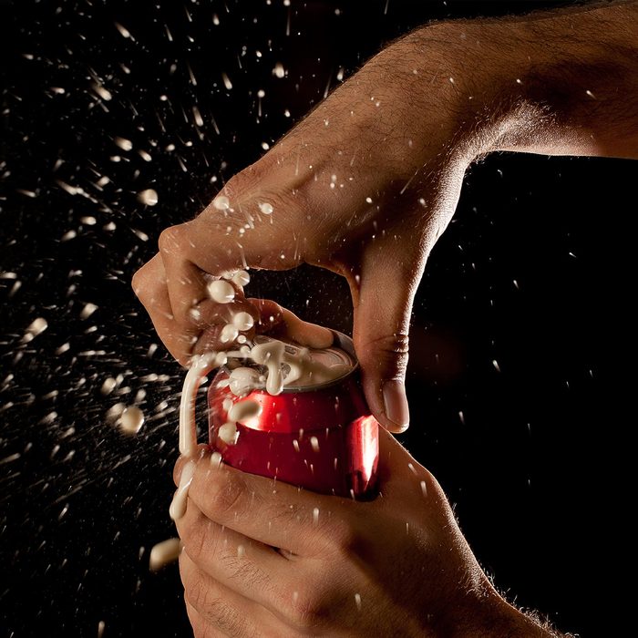 Soda can exploding as it is opened