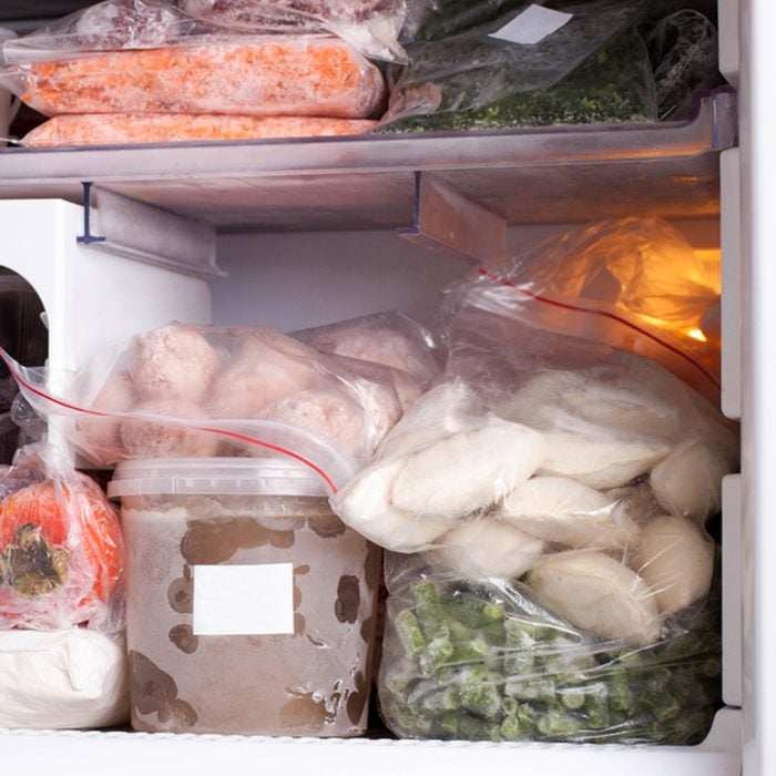 Assortment of frozen vegetables, meat and dumplings in home fridge; Shutterstock ID 1013189386; Job (TFH, TOH, RD, BNB, CWM, CM): Taste of Home