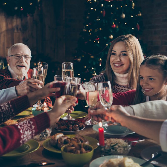 Noel evening family gathering, meeting, congrats. Cheerful grey-haired grandparents, grandchildren, daughter, son, relatives sitting at table, house party, navidad, eating dinner homemade food fun; Shutterstock ID 1190688700; Job (TFH, TOH, RD, BNB, CWM, CM): TOH