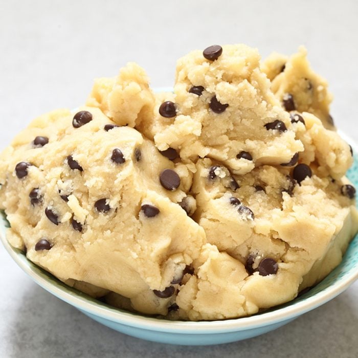 Sweet cookie dough with chocolate chips on a table; Shutterstock ID 465142328; Job (TFH, TOH, RD, BNB, CWM, CM): Taste of Home