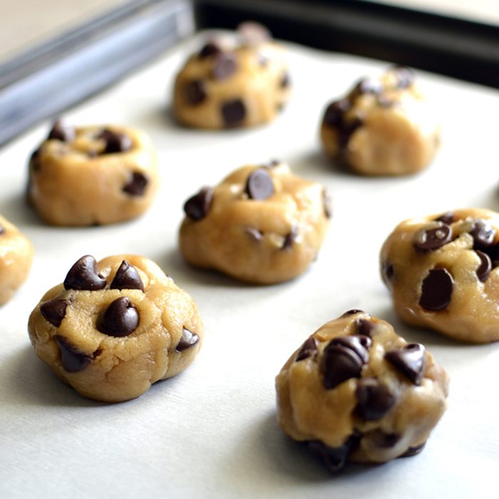 Chocolate chip cookie dough on pan; Shutterstock ID 550455415