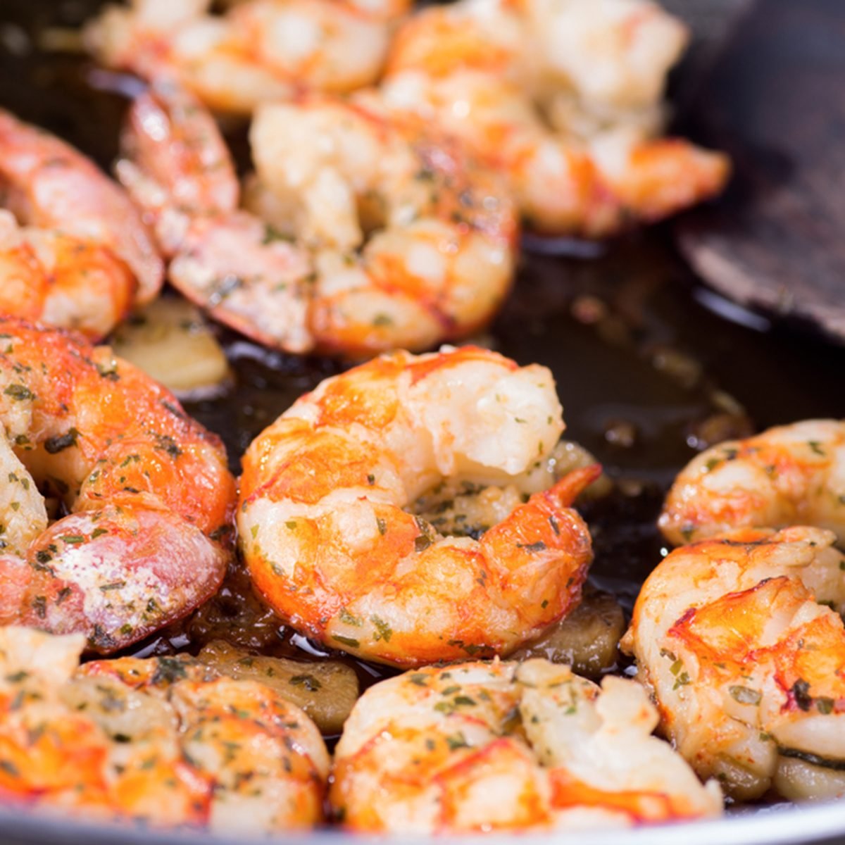 macro photograph of a shrimp and garlic stew