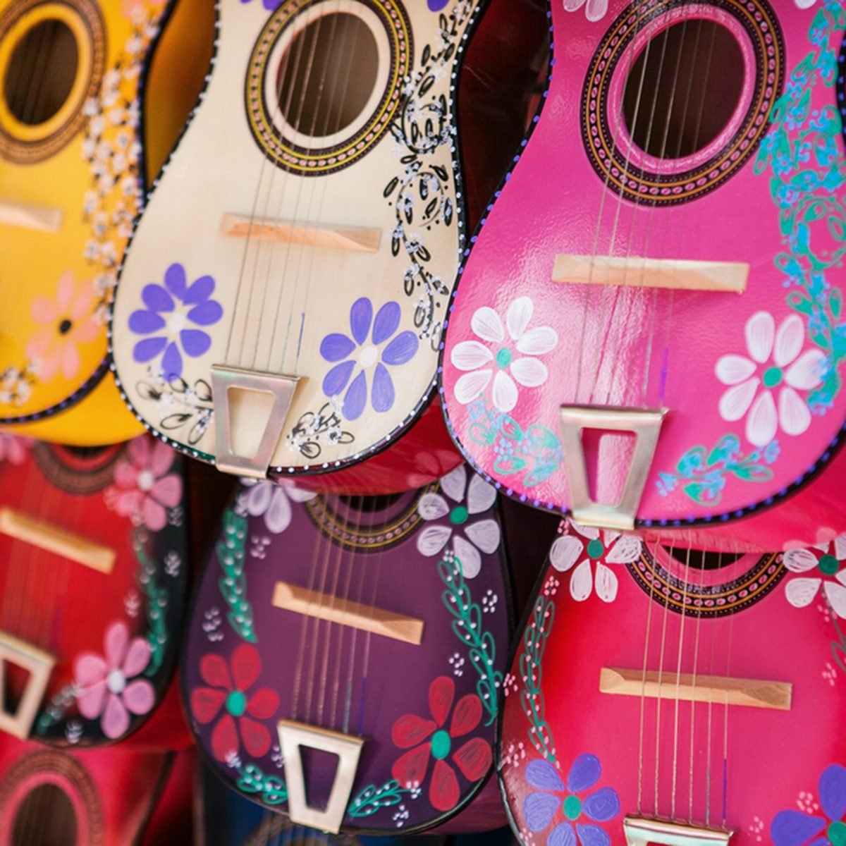 Colorful traditional Mexican guitars on market.