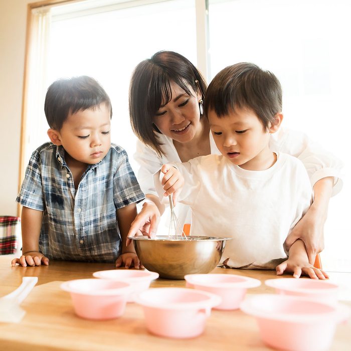 Mother and son cooking together - new years activities for kids