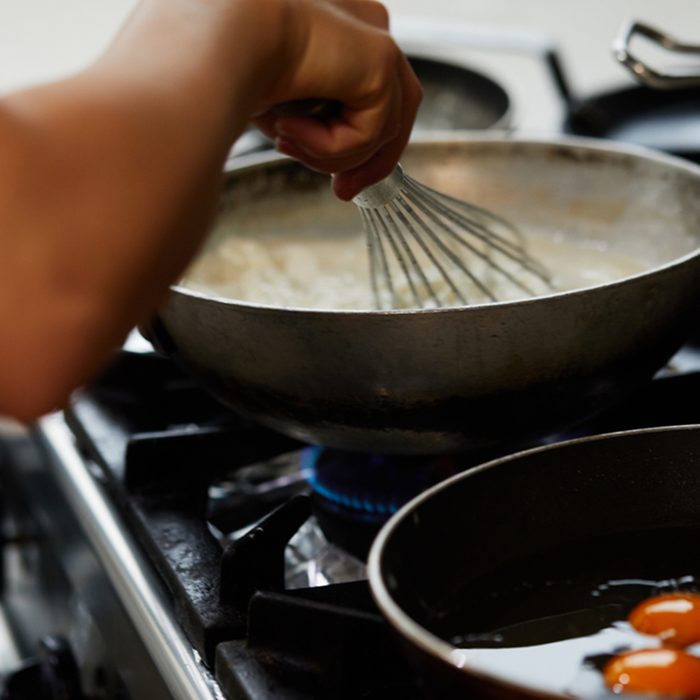 Making Gravy And Whisking