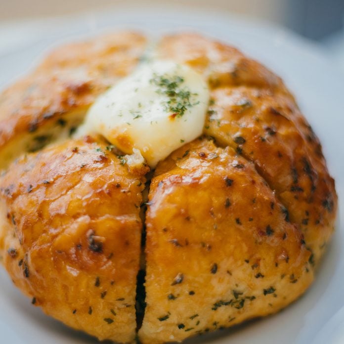 A round loaf of Korean cream cheese garlic bread.