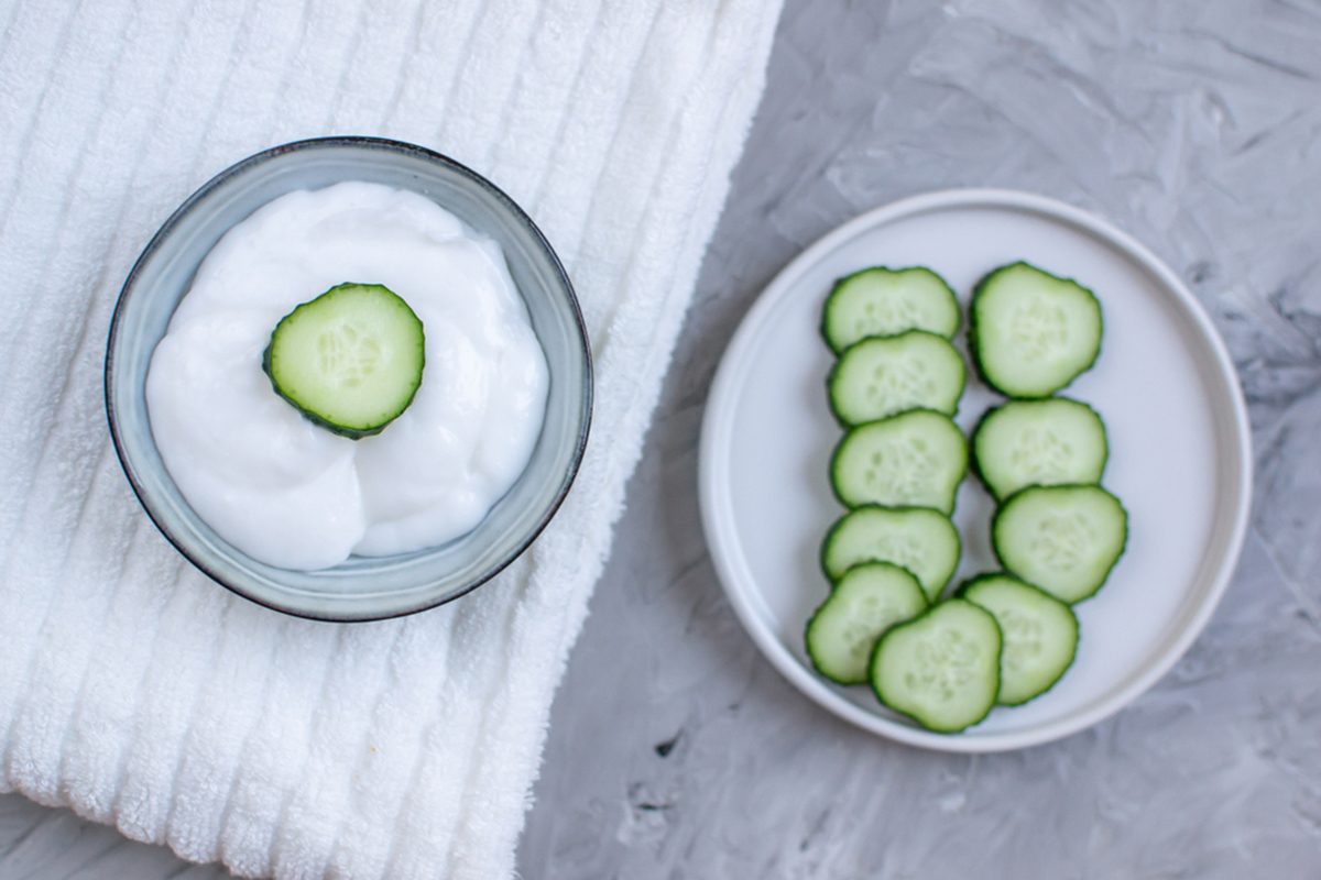 Cosmetic cream, face mask, scrub, cucumber, white bath towel