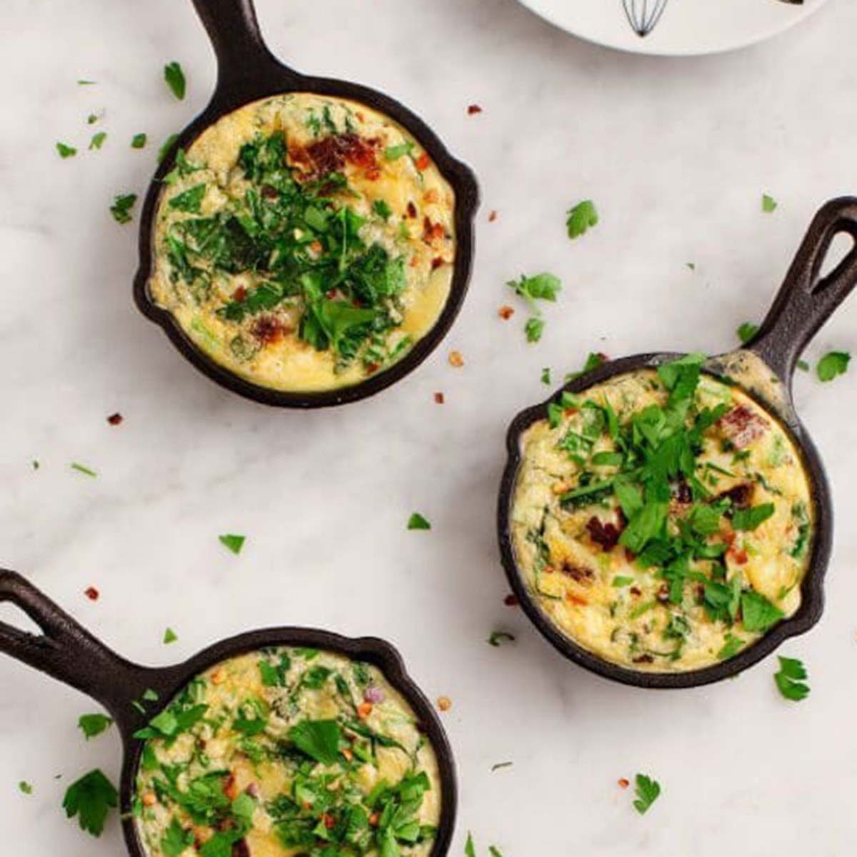 https://www.tasteofhome.com/wp-content/uploads/2019/01/mini-spinach-and-sundried-tomato-frittatas.jpg?fit=700%2C700