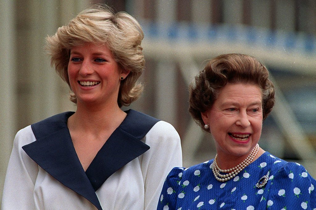 II Diana, Princess of Wales, left, and Britain's Queen Elizabeth II smile to well-wishers outside Clarence House in London