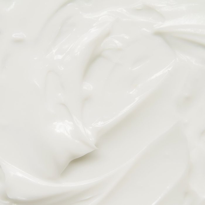 Cosmetics. Cream white background texture