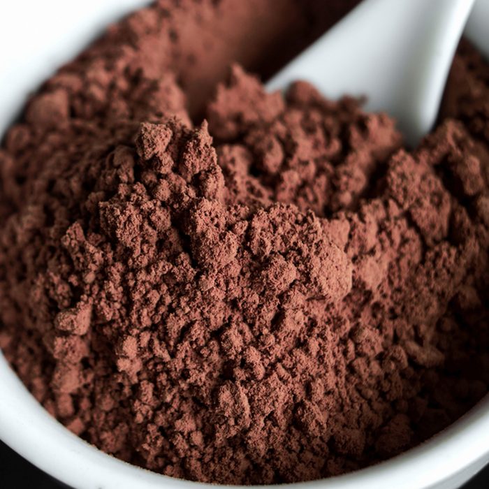 Cocoa powder in a bowl close up