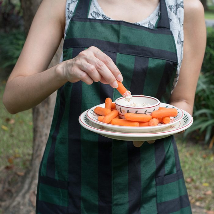Baby carrots with ranch dressing dip in outdoor