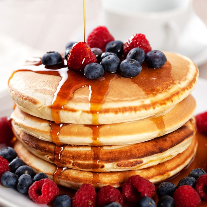 Pancakes with berries and maple syrup; Shutterstock ID 365501507; Job (TFH, TOH, RD, BNB, CWM, CM): TOH