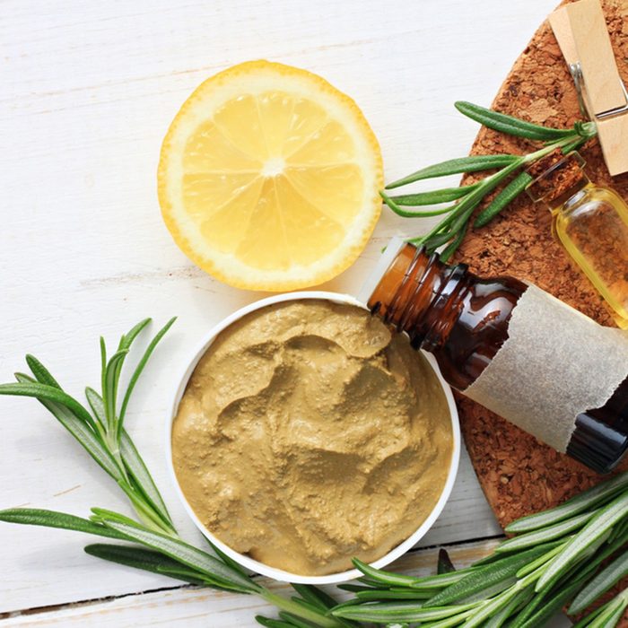 Cosmetic clay facial mask, rosemary oil and herbs, lemon. Body wrap domestic treatment. Top view. ; Shutterstock ID 404158192; Job (TFH, TOH, RD, BNB, CWM, CM): TOH