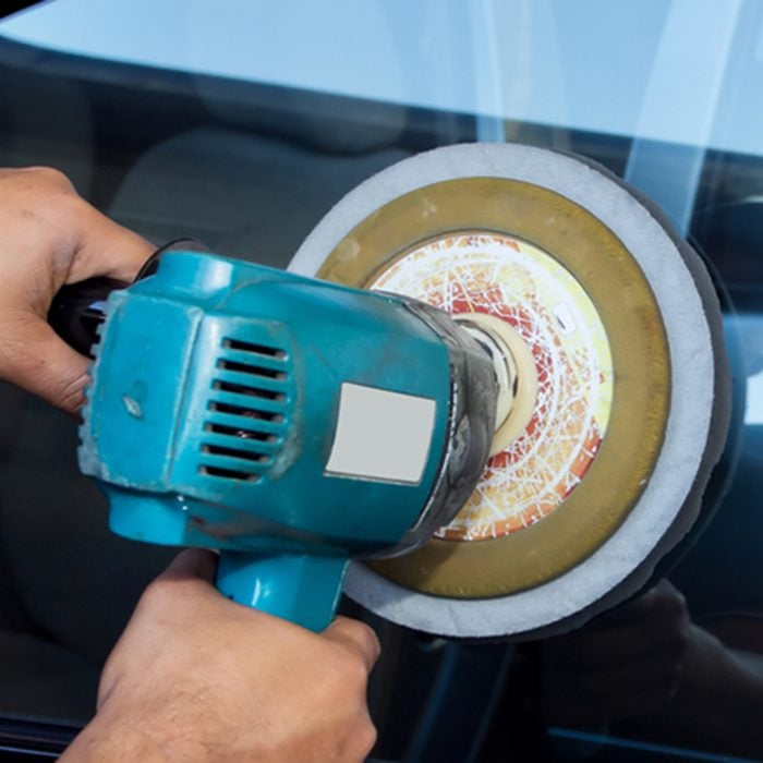 Car Glass polishing with power buffer machine. CAR CARE images. closeup Useful as background for design-works.; Shutterstock ID 89574067; Job (TFH, TOH, RD, BNB, CWM, CM): TOH