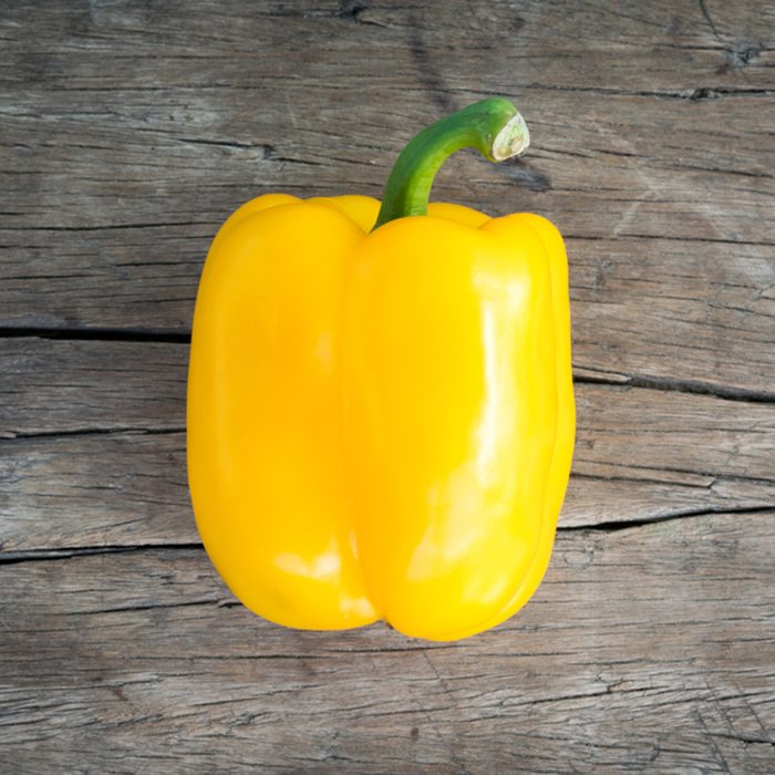 yellow Sweet bell pepper on wood background