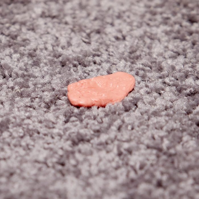 Gum stuck in carpet