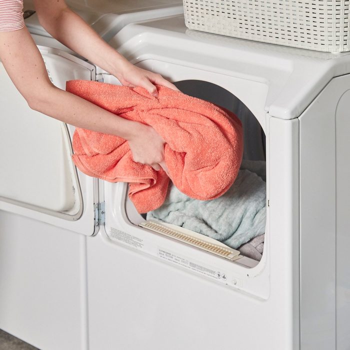 Putting towels in the dryer