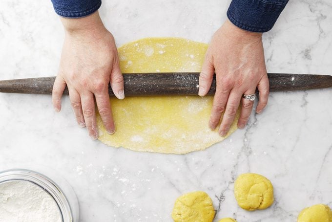 roll out the dough for homemade pasta