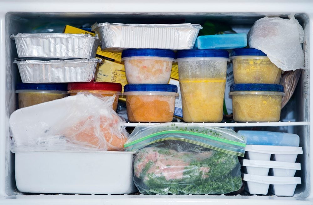a freezer packed with chicken, soup and various frozen food; Shutterstock ID 791543500; Job (TFH, TOH, RD, BNB, CWM, CM): TOH Freezing Soup
