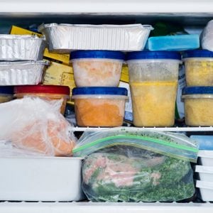 a freezer packed with chicken, soup and various frozen food; Shutterstock ID 791543500; Job (TFH, TOH, RD, BNB, CWM, CM): TOH Freezing Soup