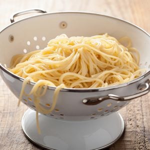 spaghetti in colander