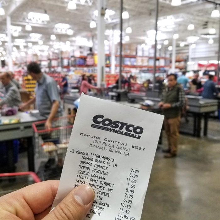 MONTREAL, CANADA - OCTOBER 5, 2018: A hand holding a receipt with the brand name and logo in Costco warehouse. Costco is an American corporation which operates a chain of membership only warehouses.; Shutterstock ID 1280270092; Job (TFH, TOH, RD, BNB, CWM, CM): TOH