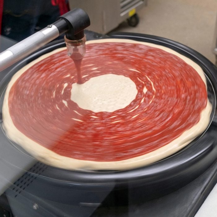 Automated pizza sauce delivery system with MOTION BLUR.; Shutterstock ID 1334030297; Job (TFH, TOH, RD, BNB, CWM, CM): TOH