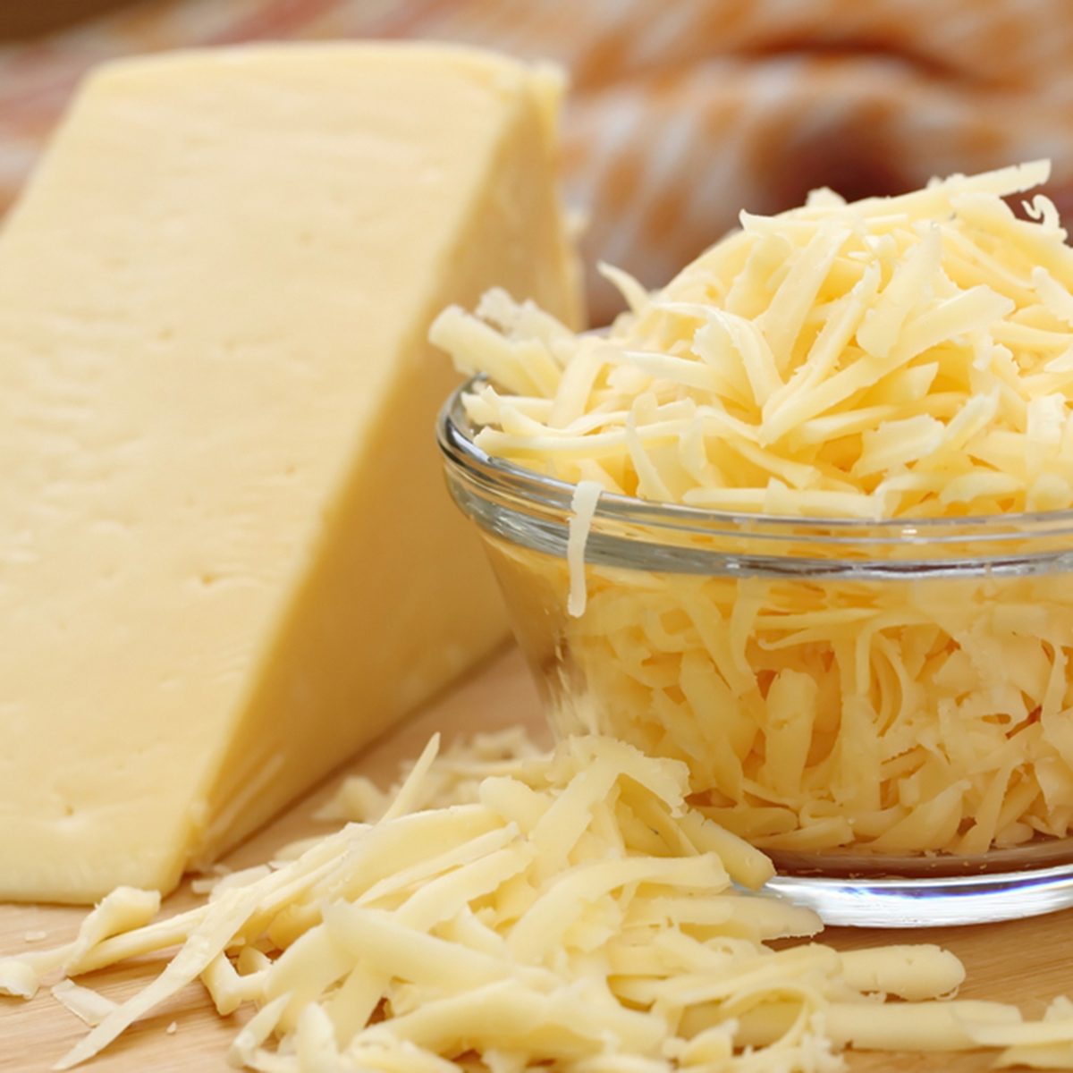 Grated cheese in a glass bowl; Shutterstock ID 365625941; Job (TFH, TOH, RD, BNB, CWM, CM): TOH