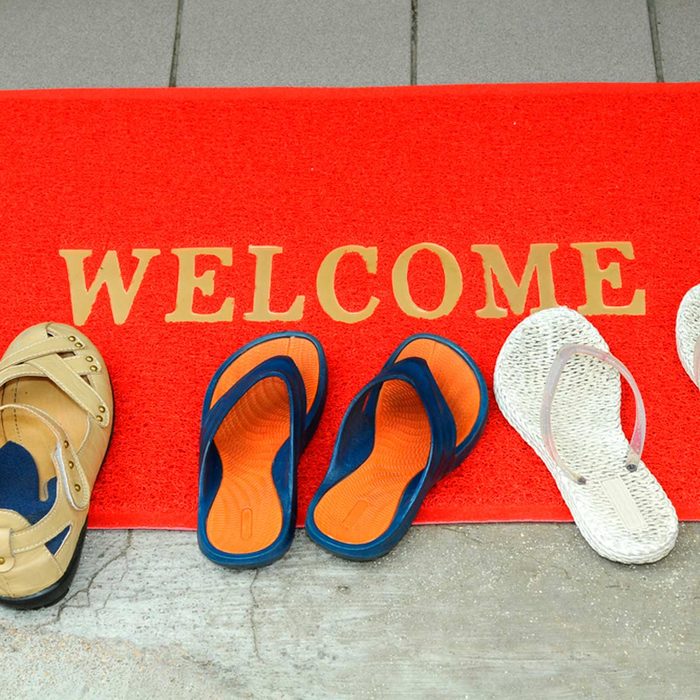 Red welcome mat