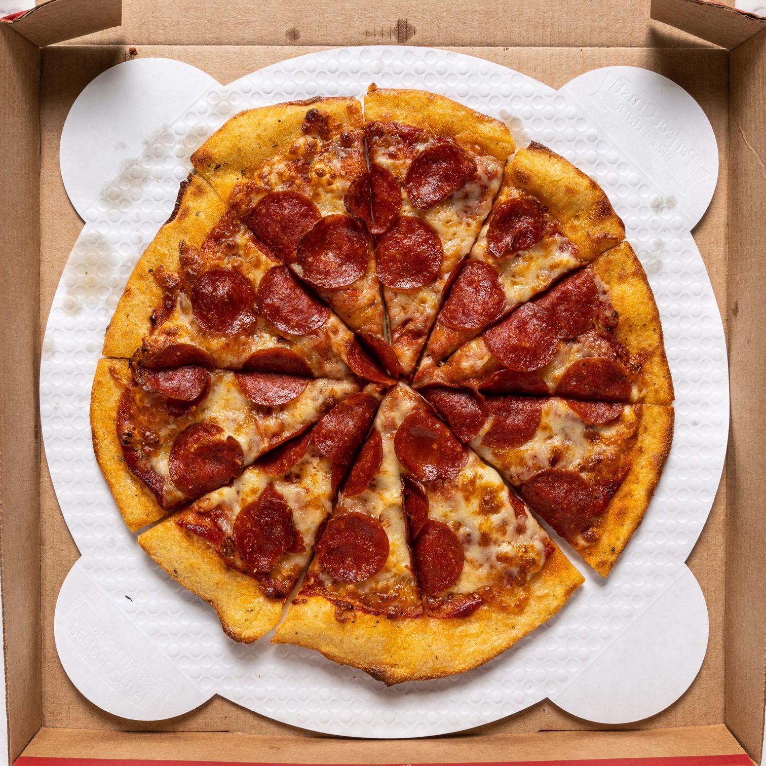 Chuck E Cheese pizza in a box