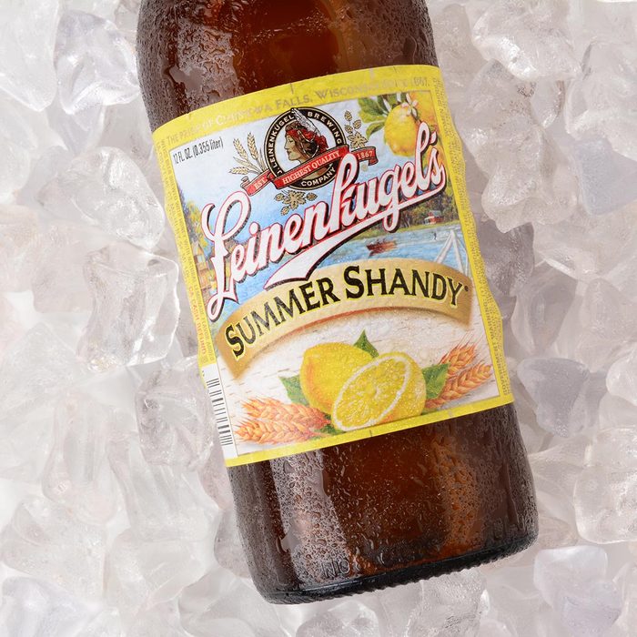 A bottle of Leinenkugel Summer Shandy on a bed of ice. 