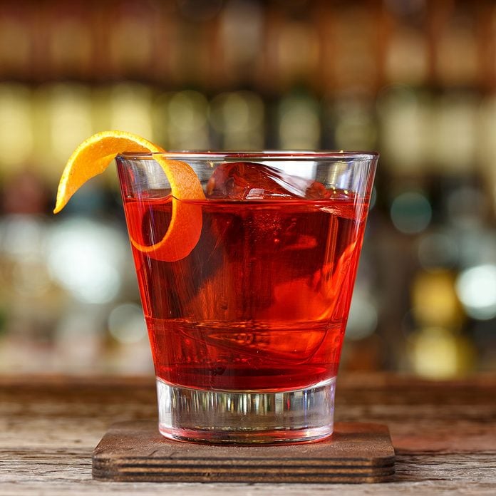 Classic cocktail Negroni with gin, campari and martini rosso