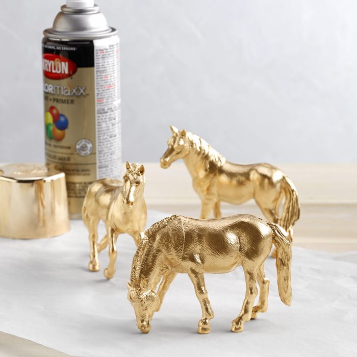 three golden horse ornaments, Stable-Inspired Decorations