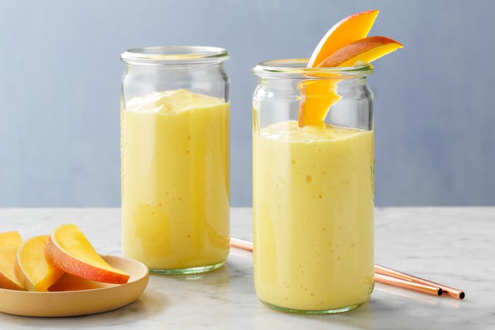 Mango Smoothies in glass jar glasses