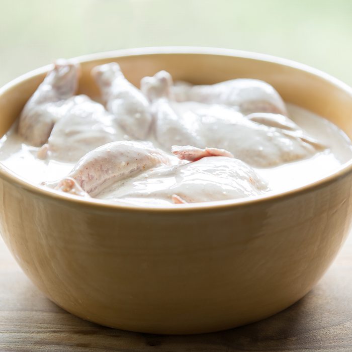 Cornish hens soaking in a buttermilk brine.