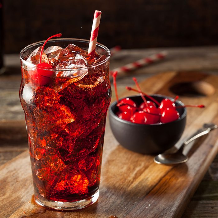Sweet Refreshing Cherry Cola with Garnish and Straw