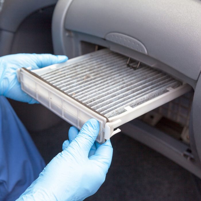 Replacing dirty cabin pollen air filter for a car; Shutterstock ID 1268151676; Job (TFH, TOH, RD, BNB, CWM, CM): Taste of Home