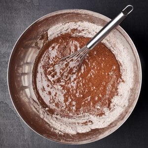 bowl of brownie batter and whisk