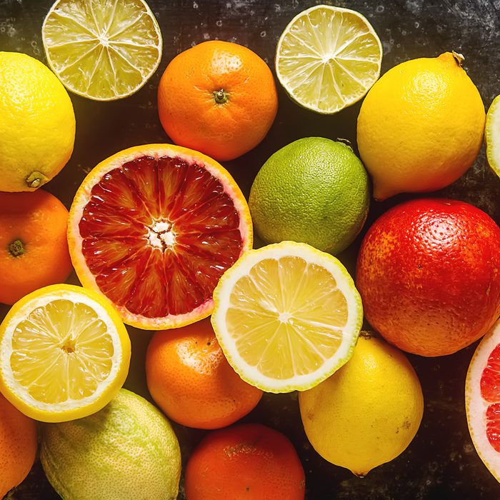 Citrus juice fruit and slices of orange, grapefruit, lemon, lime. Vitamin C. Black background. ; Shutterstock ID 588497897