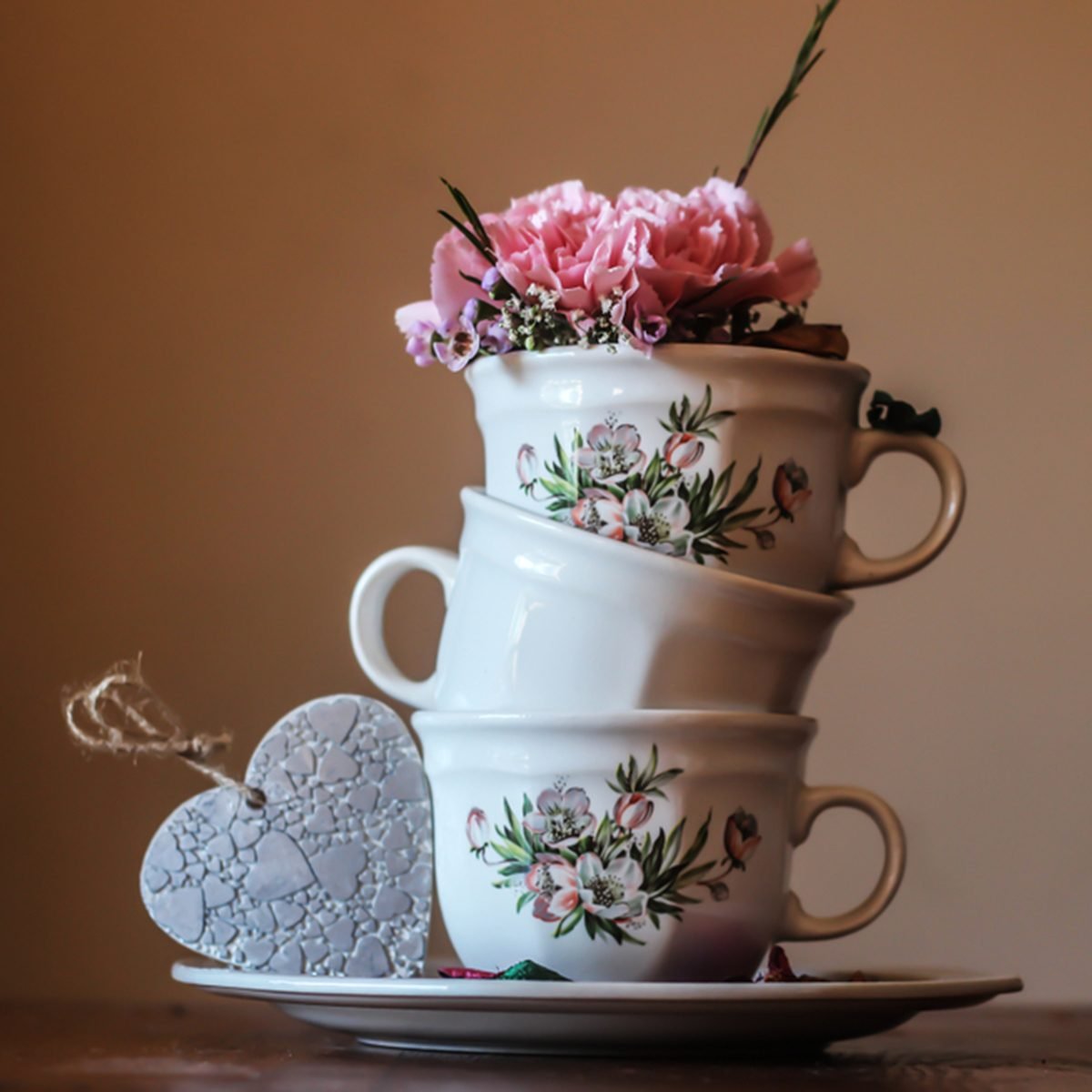 https://www.tasteofhome.com/wp-content/uploads/2019/04/tea-cup-flower-pots-shutterstock_1293225196.jpg?fit=700%2C700