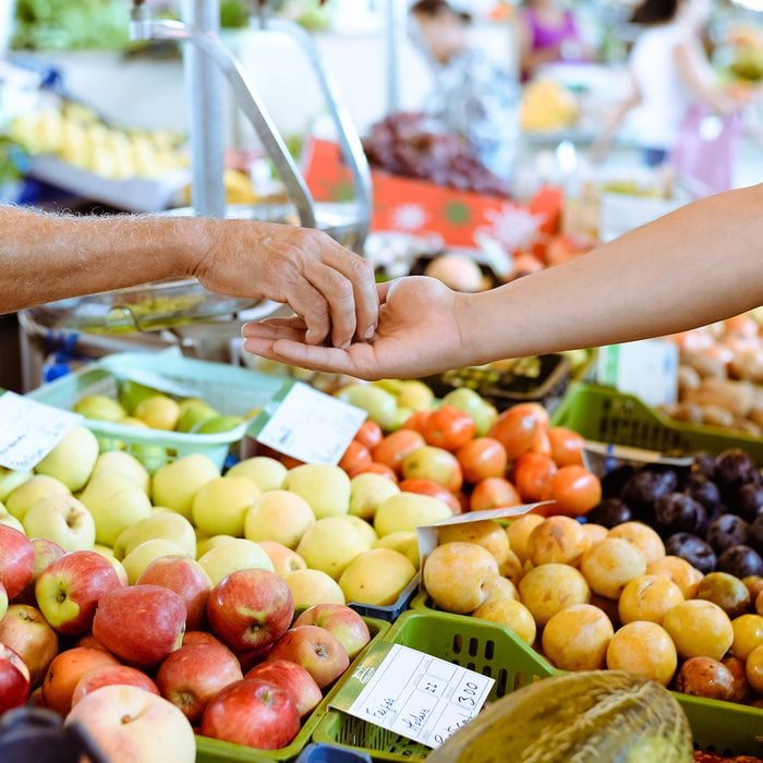Picture of marketplace with different fruits. 