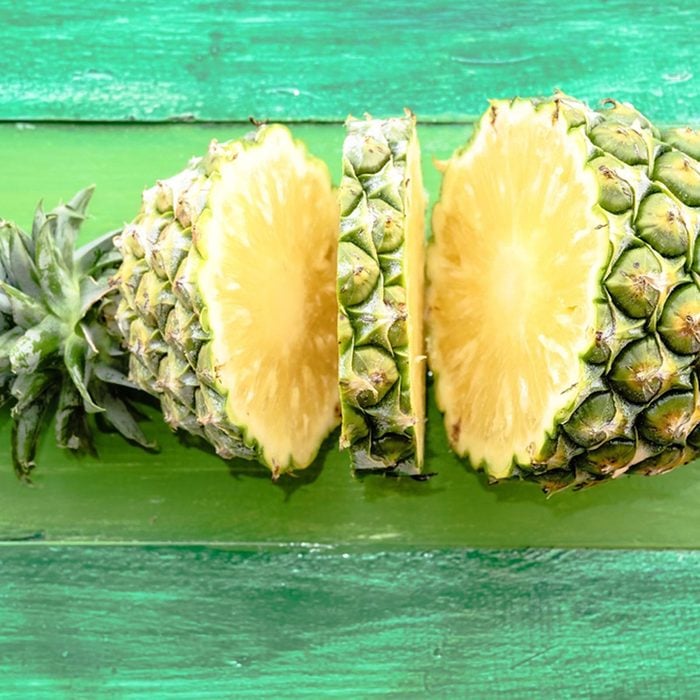 Pineapple cut to the core in two places