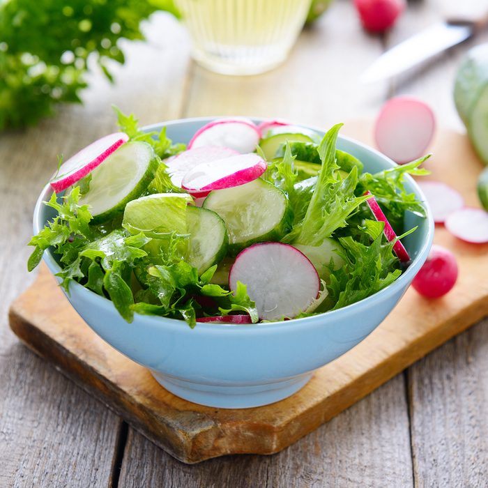 Fresh spring salad from cucumbers and radish