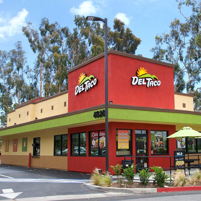 Irvine, CA - June 16, 2018: Del Taco Restaurants Inc, a fast food restaurant chain that specializes in American style Mexican cuisine as well as American foods such as burgers, fries, and shakes; Shutterstock ID 1116574781; Job (TFH, TOH, RD, BNB, CWM, CM): TOH
