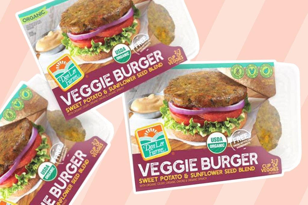 Veggie burgers against a striped pink background