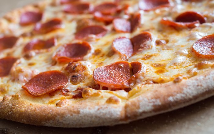 Fresh baked pepperoni pizza, shallow depth of field