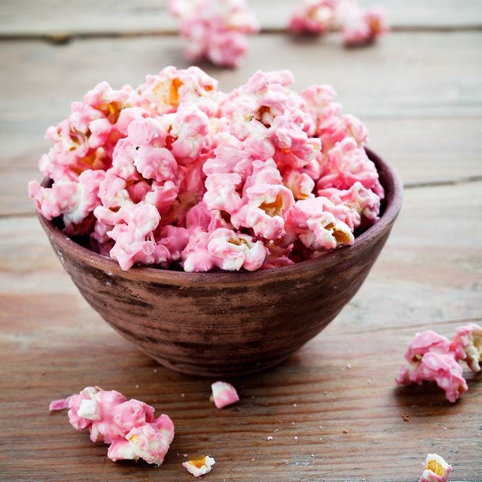 Pink chocolate pop corn in brown bow