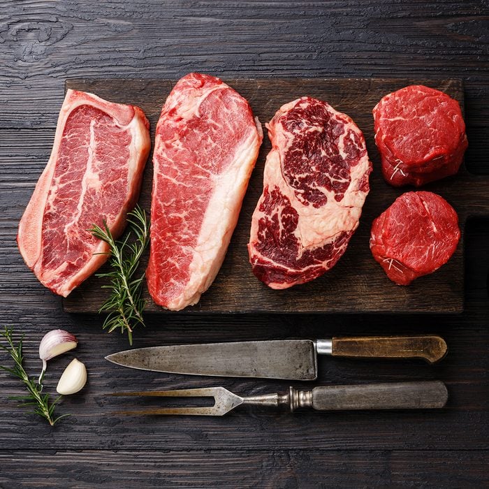 Variety of Raw Black Angus Prime meat steaks Blade on bone